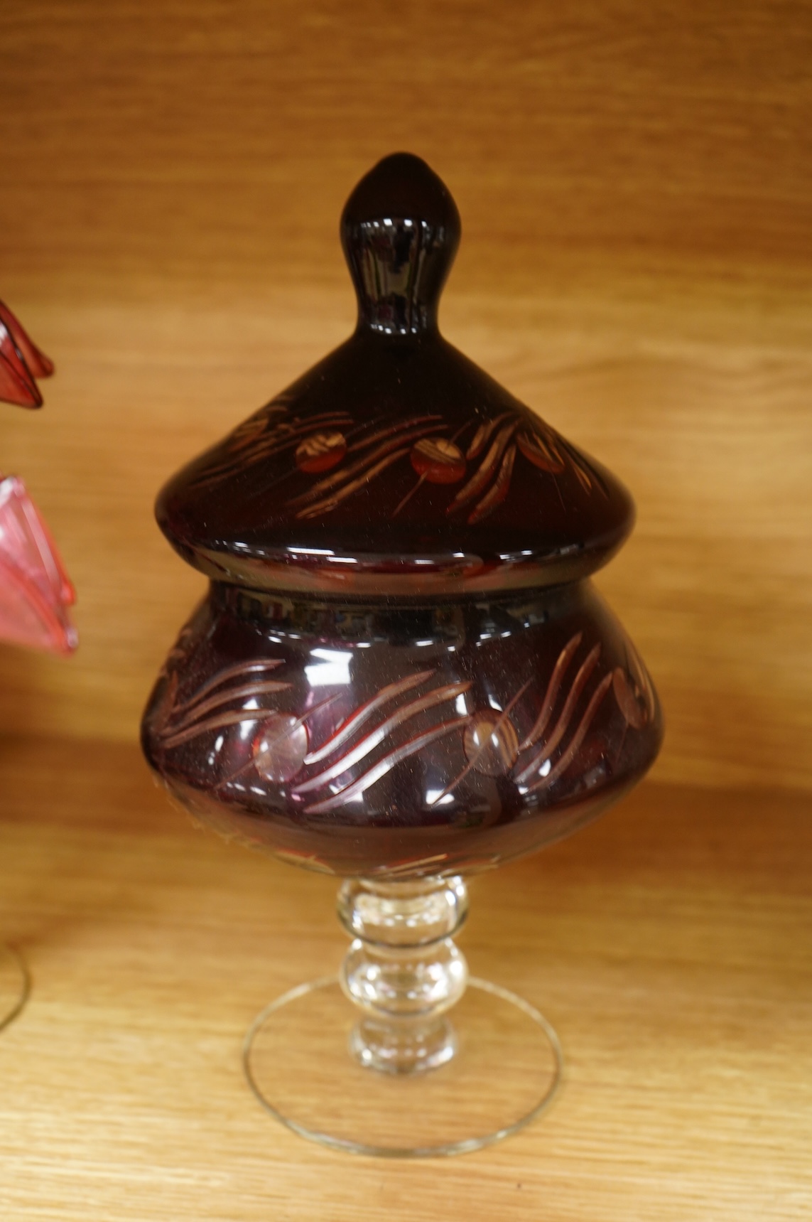 A collection of 19th century and later glassware to include three goblets, a pair of vases with trailed decoration and a Caithness glass vase, largest 28cm high